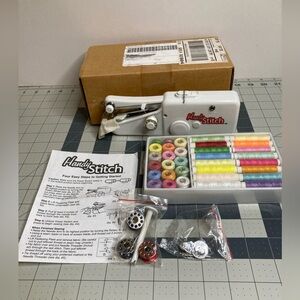 Handy Stitch Deluxe AC/DC- Portable Sewing Machine. Carry Case Many Extras